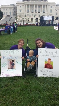 Women and baby in front of Capitol