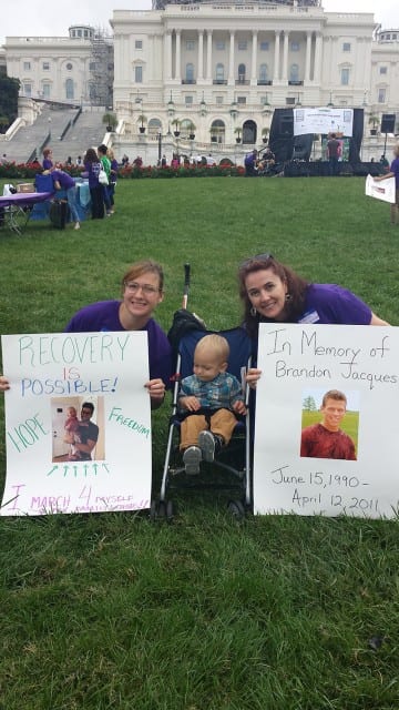 Women and baby in front of Capitol
