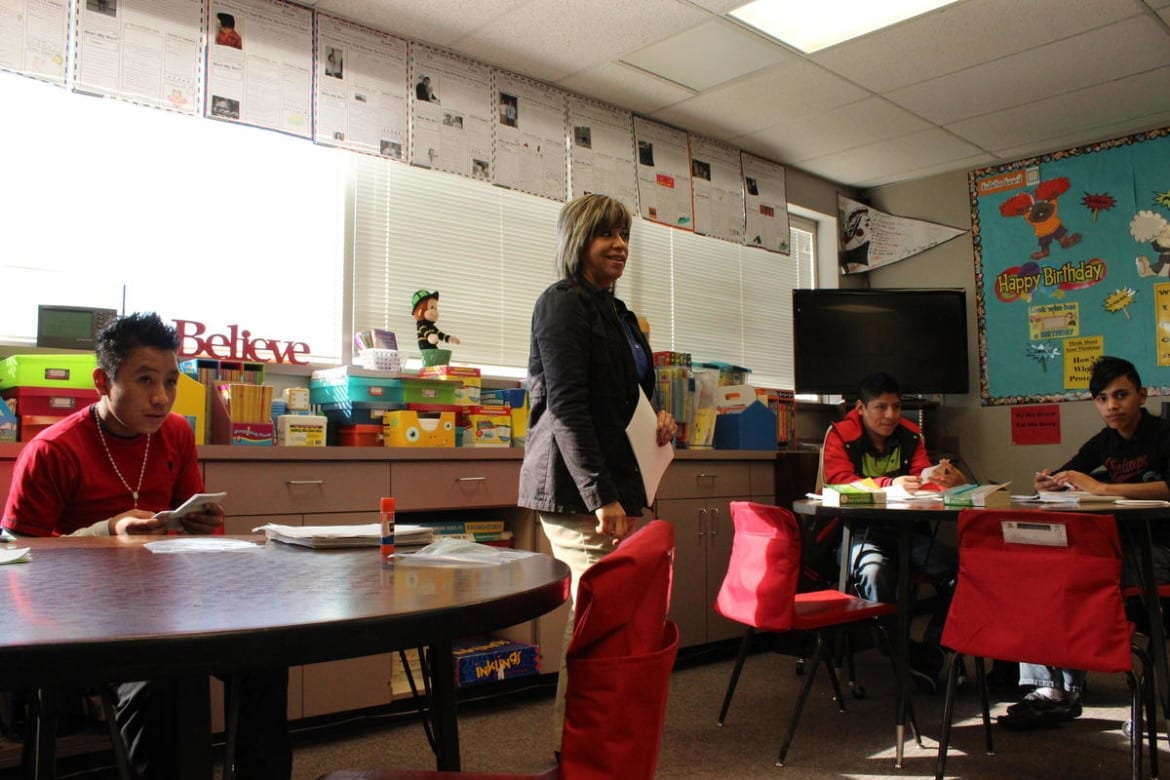 A teacher and students in a classroom