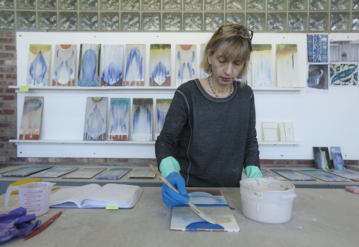 Cary Esser glazes ceramic tiles for a new series of work titled "Veil Tyles"
