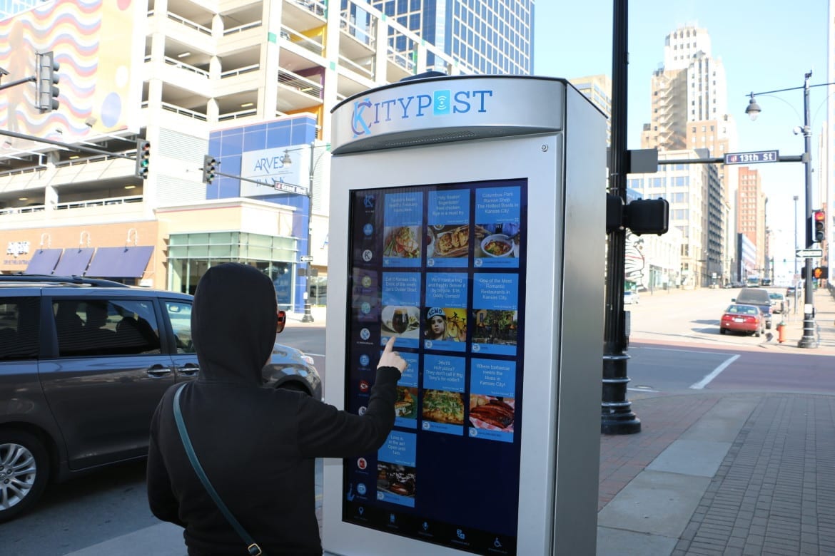 A person using a smart kiosk