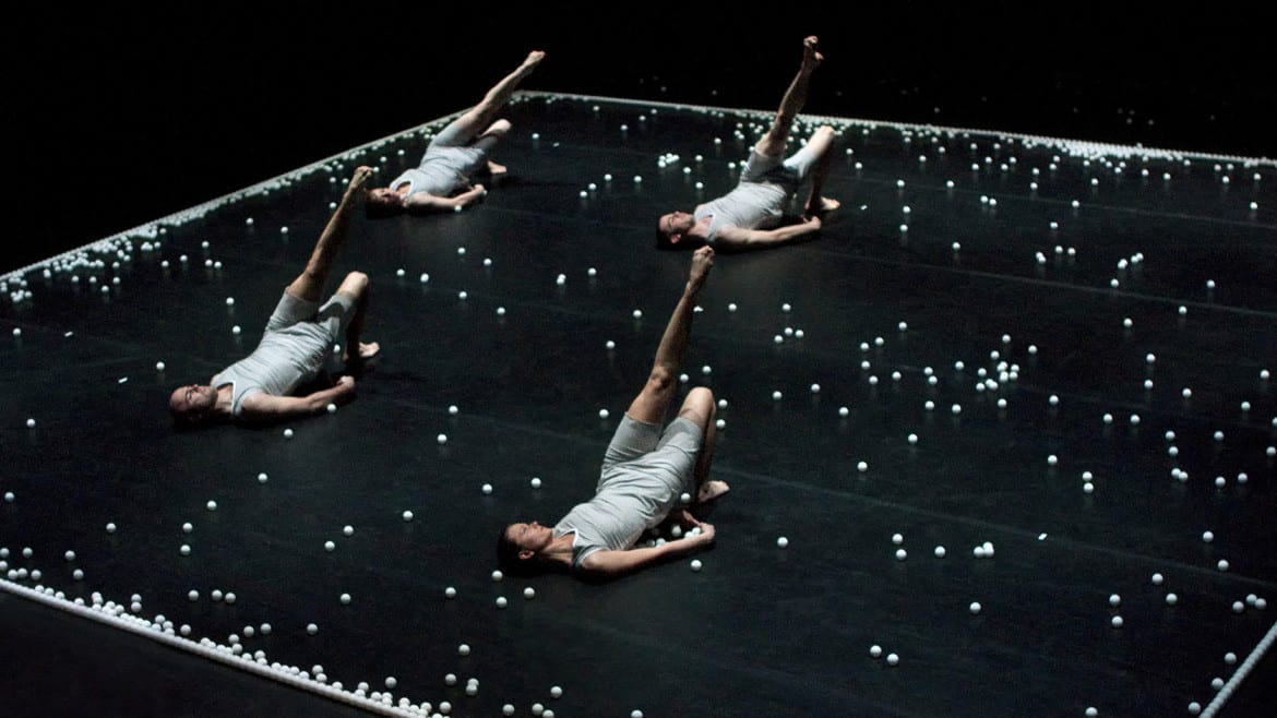 Ballet dancers with ping pong balls