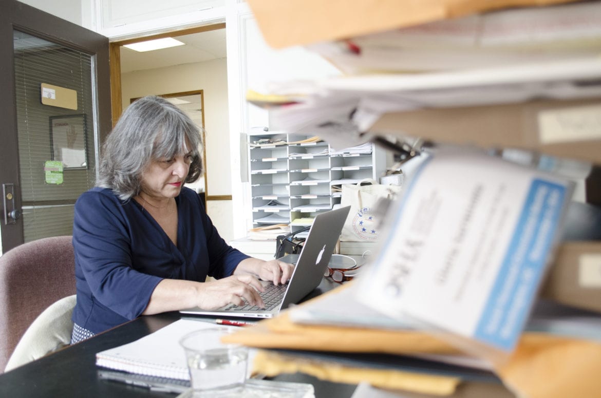 A woman at her desk