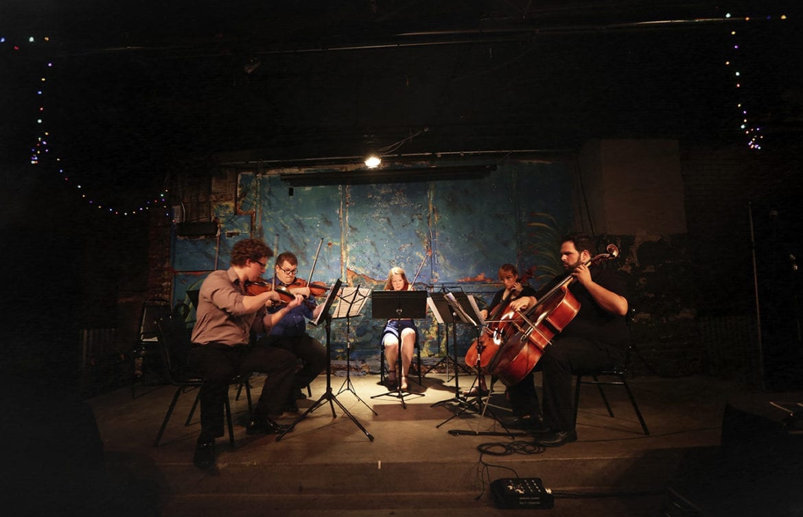 Classical music group performs.