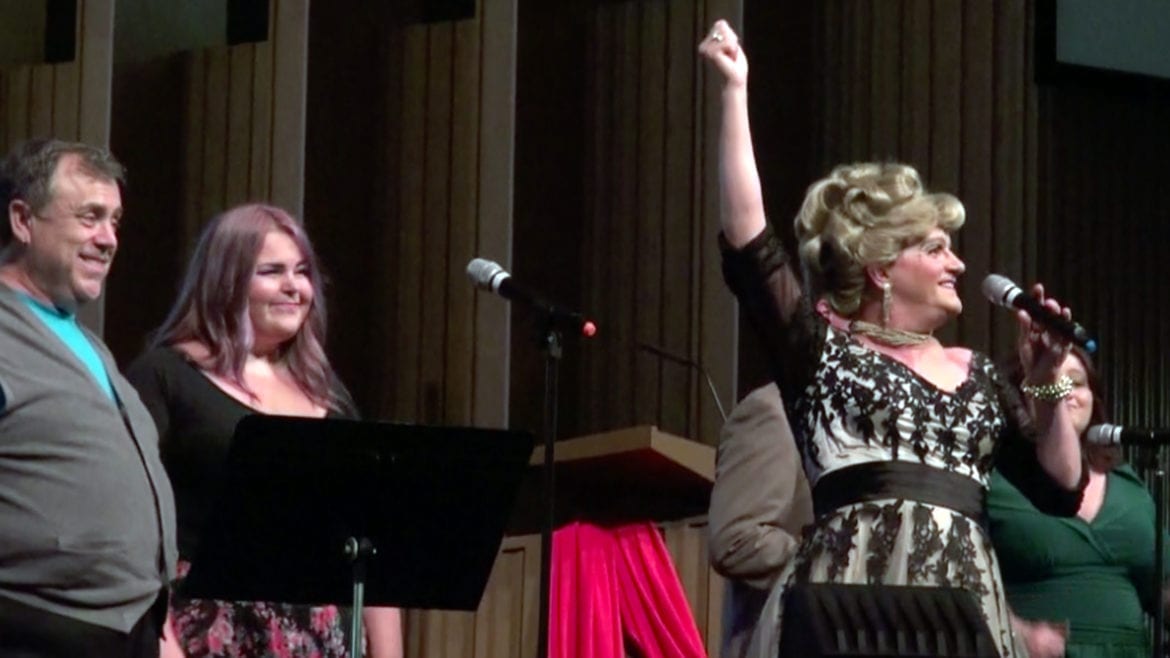 Group singing on stage