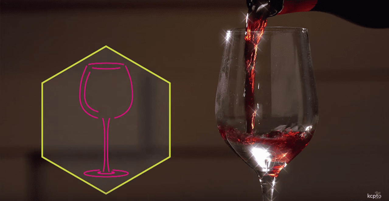 Wine pouring into a glass.