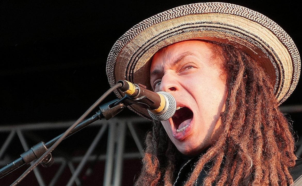 A man singing into a microphone.