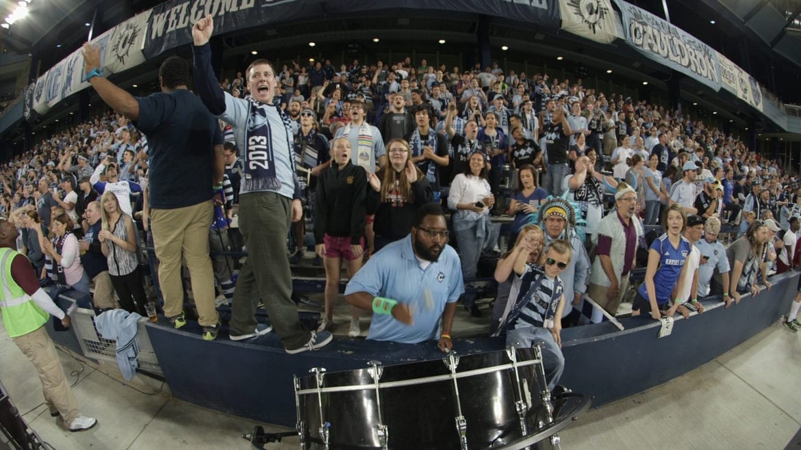 A group of soccer fans chanting