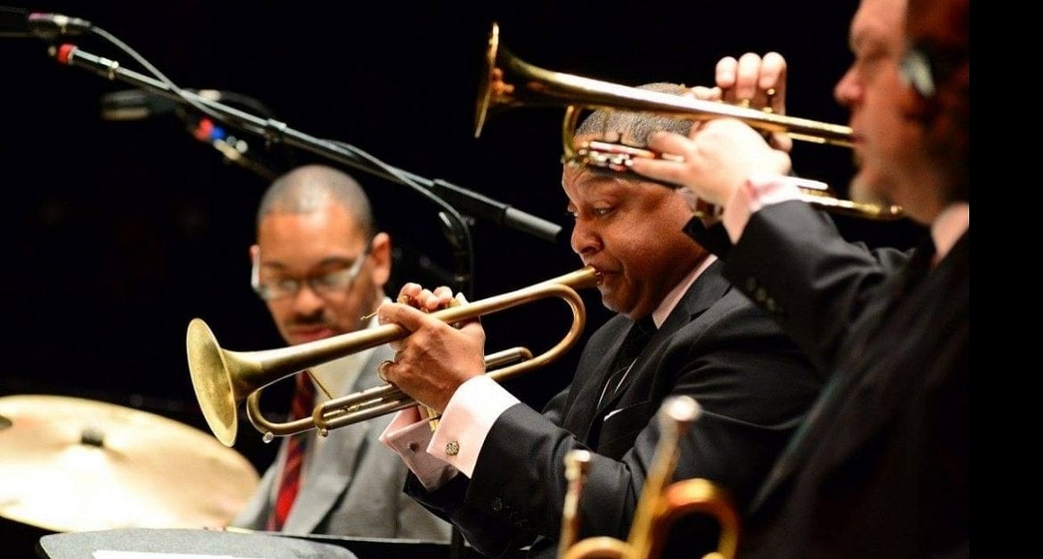 Jazz musicians playing instruments.