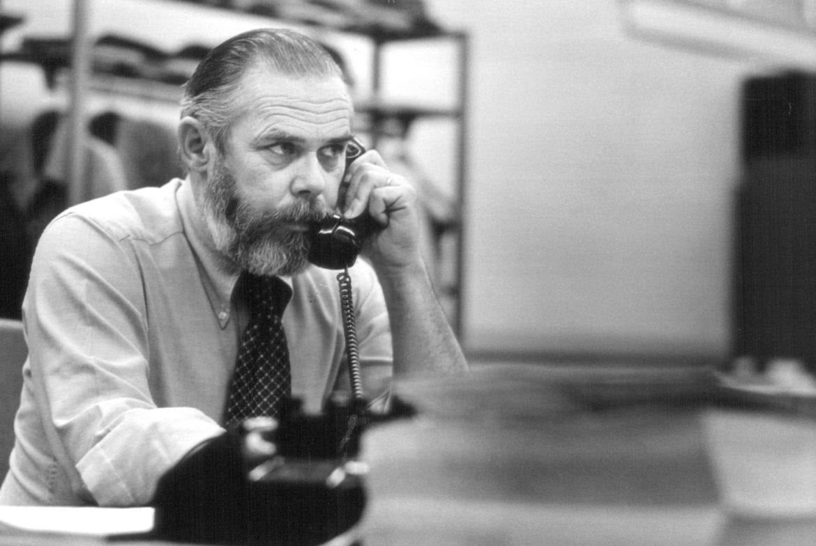 A journalist on a phone