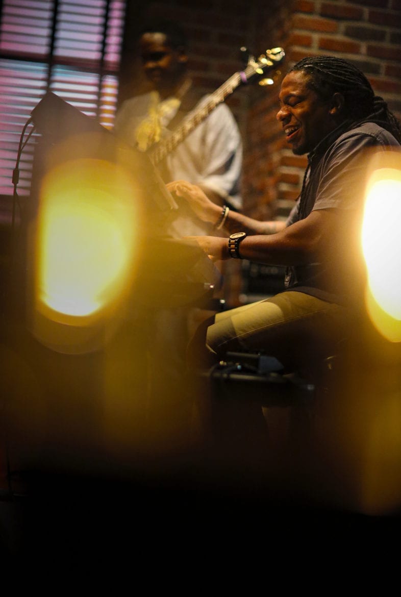 A man playing in a band.