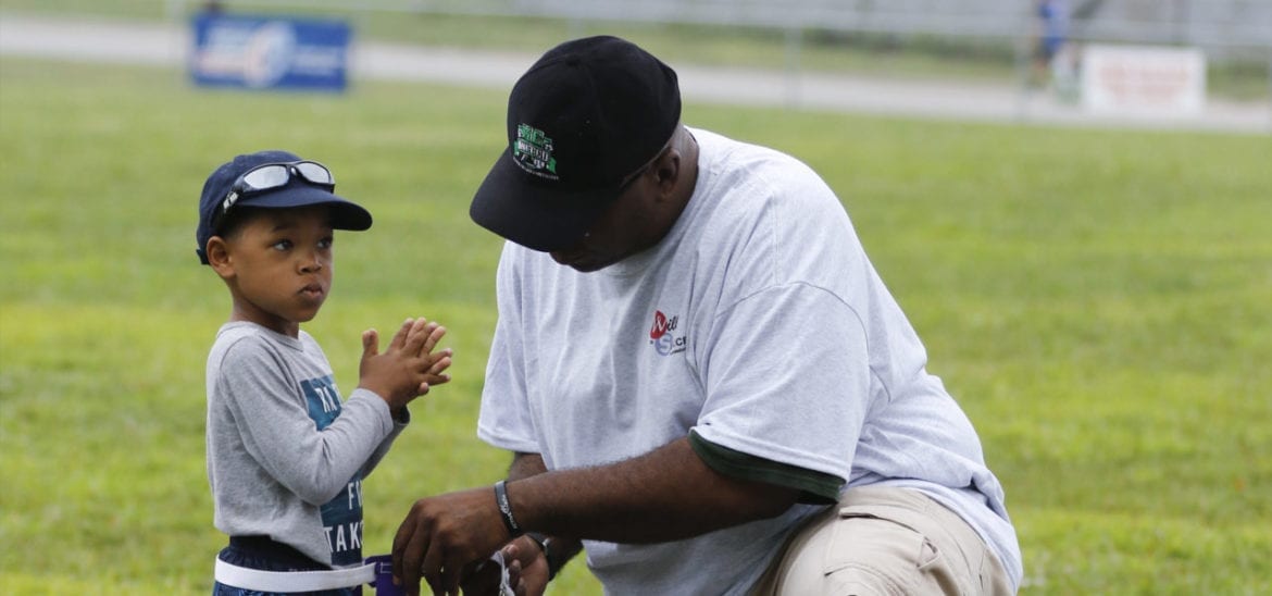 Pastor Roberson with child