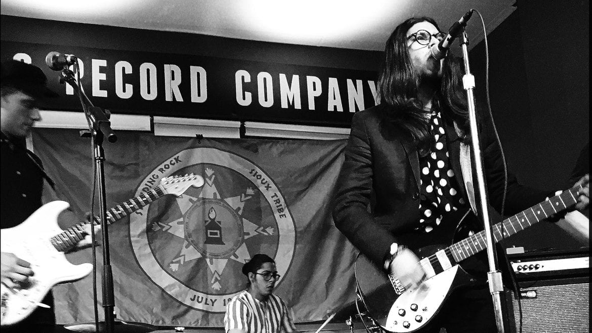 musicians playing on stage