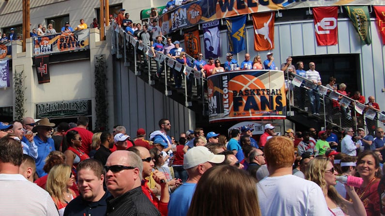 Crowds of people in the Power and Light District during basketball games.
