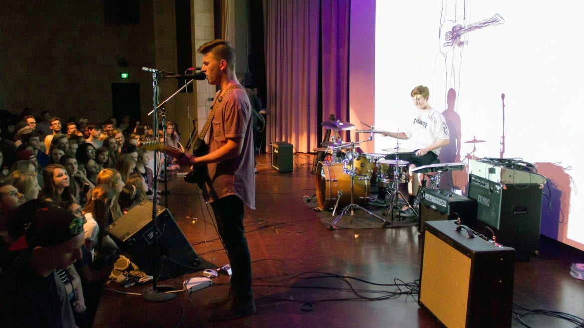 a band playing on stage