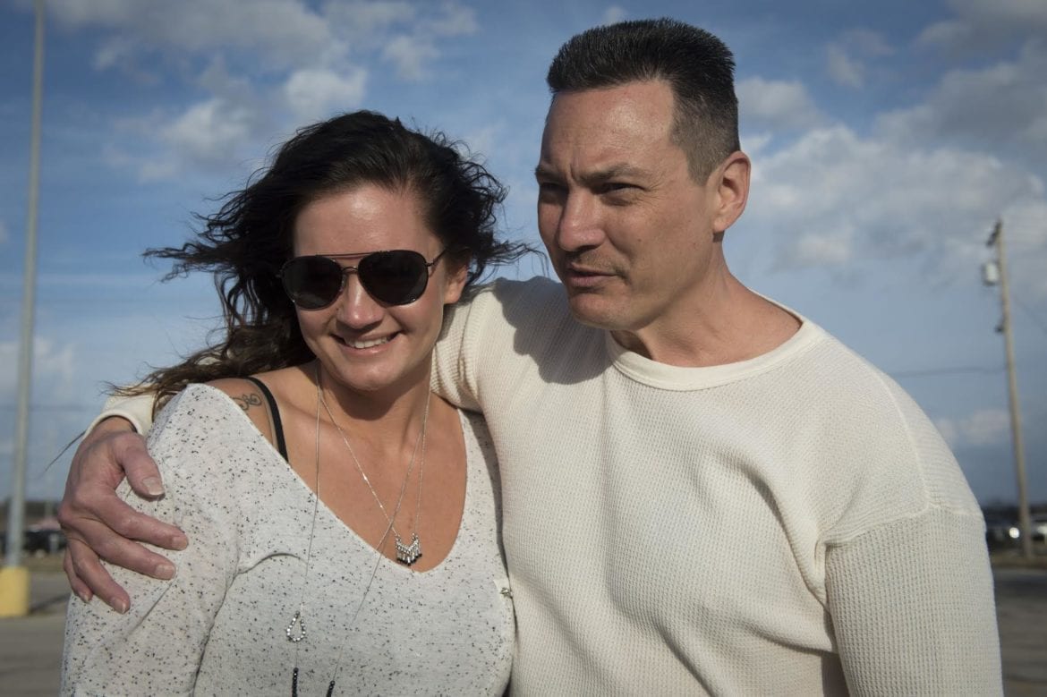 a man and his daughter hug