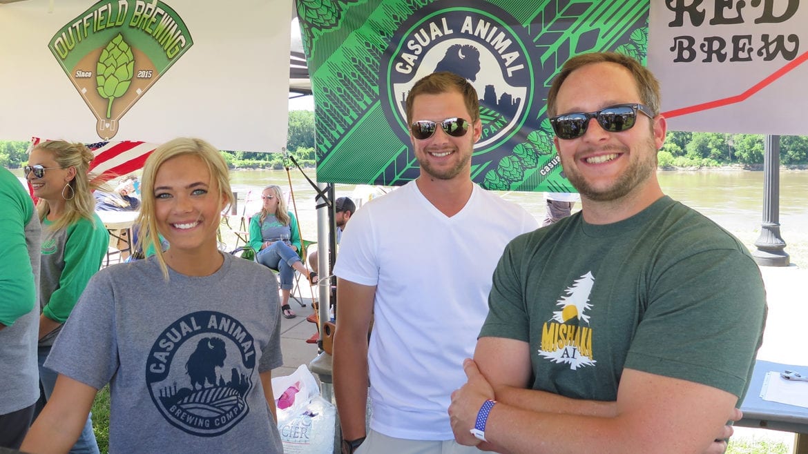 Chloe Burkhead, Alex Gray (Kyle's brother), and brewer Kyle Gray.