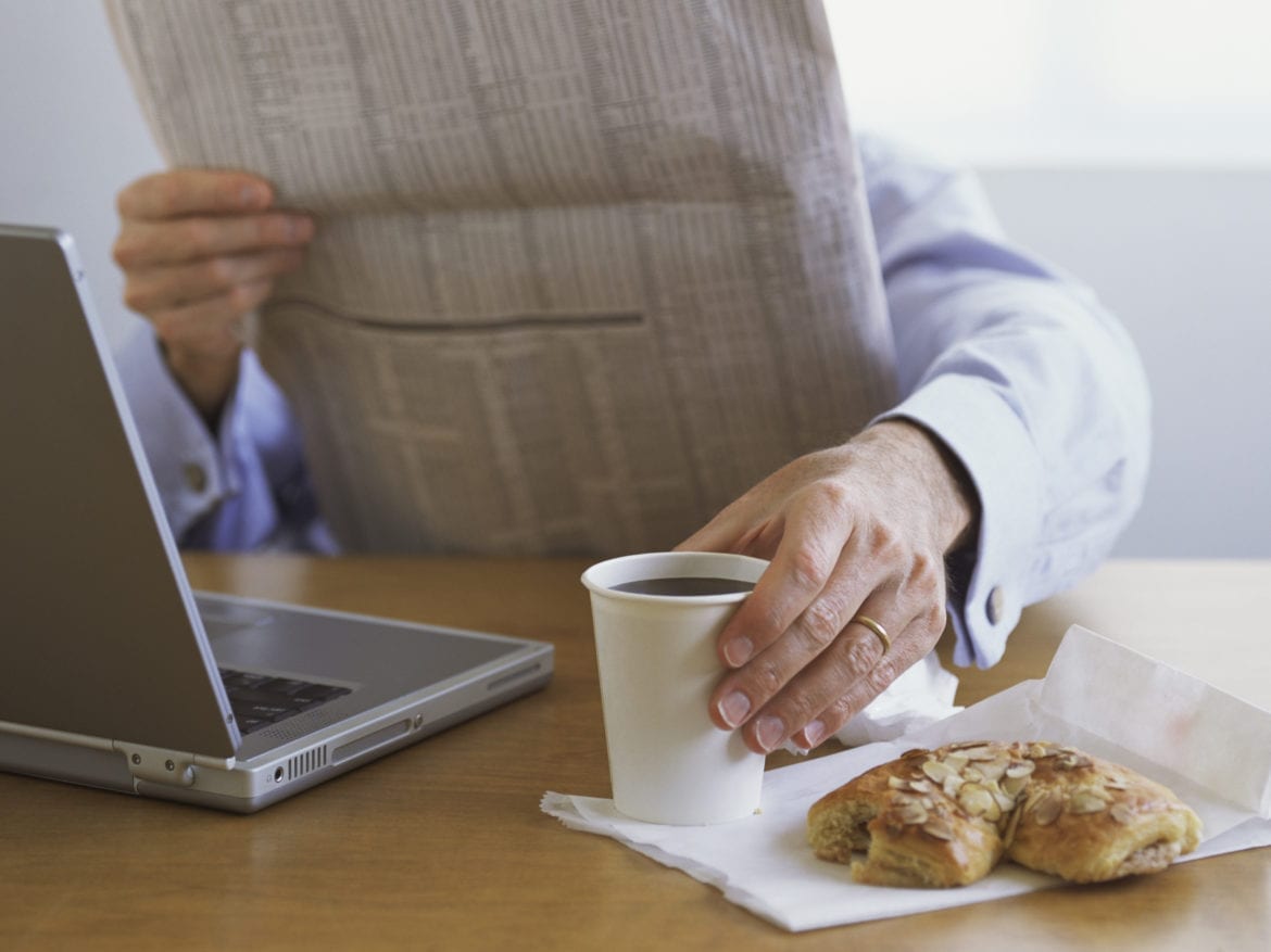 Man eating breakfast.