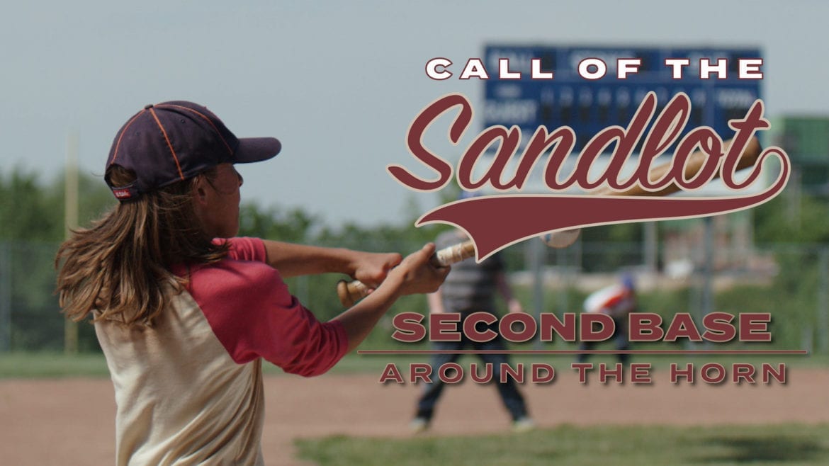 A boy hits a baseball for "Call of the Sandlot"