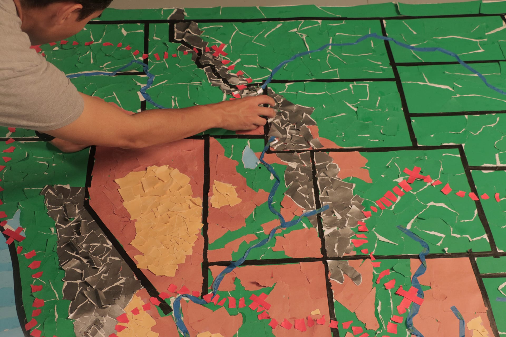 A man working on a map