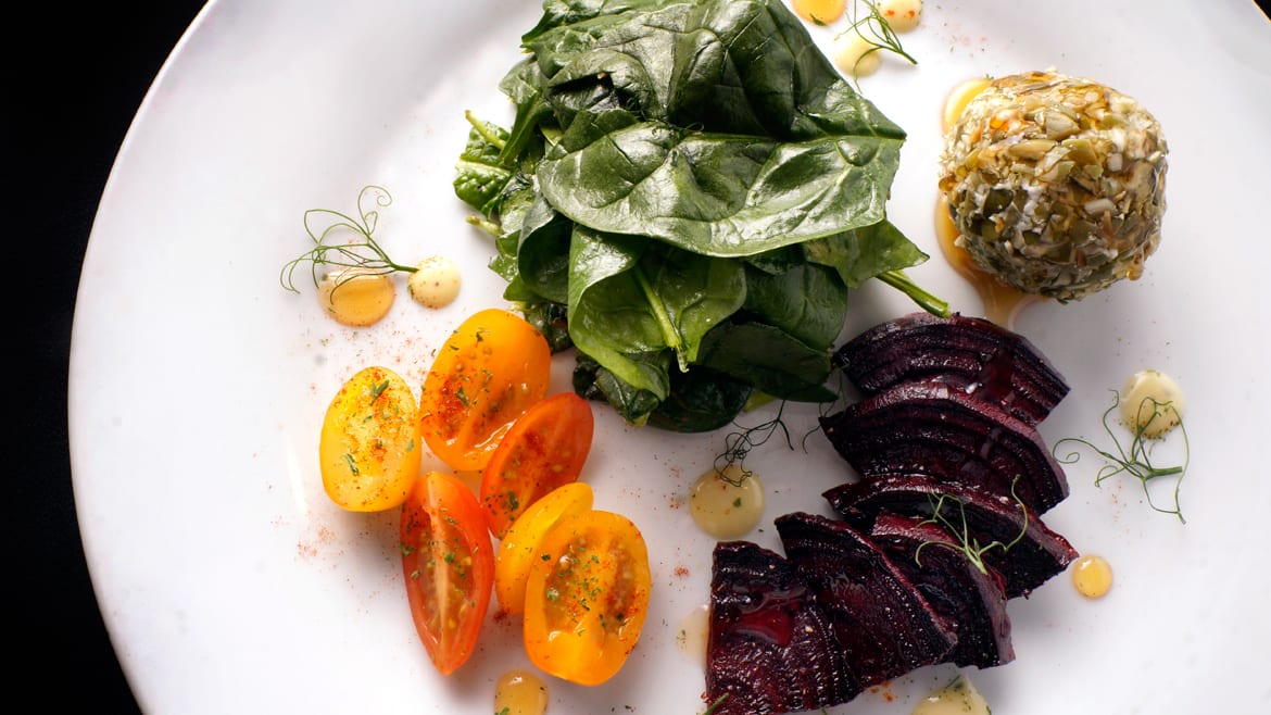 A deconstructed arugula-beet salad