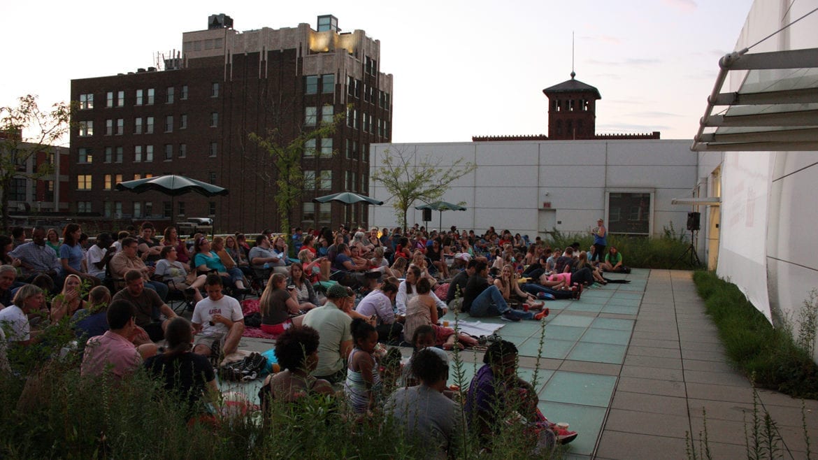 Movie-goers on top of Kansas City Public Library downtown central library for Off the Wall film festival