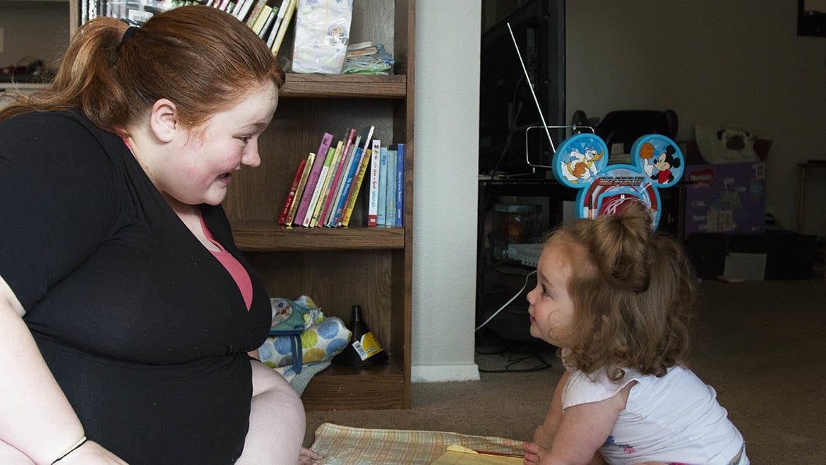 former foster care youth with her 19-month old daughter