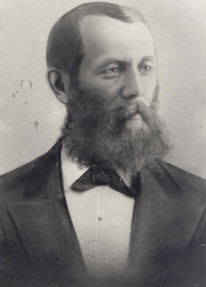 A back and white photo of a man.