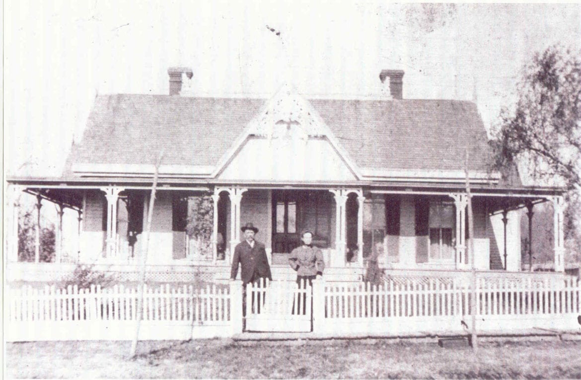 A black and white photo of a home.