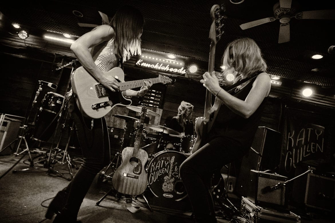 A band performing on stage.