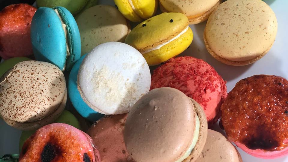 whole kaleidoscope of Covet Bakery's macarons
