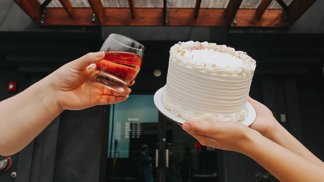 Have your cake and wine too with McLain's Market Lawrence.