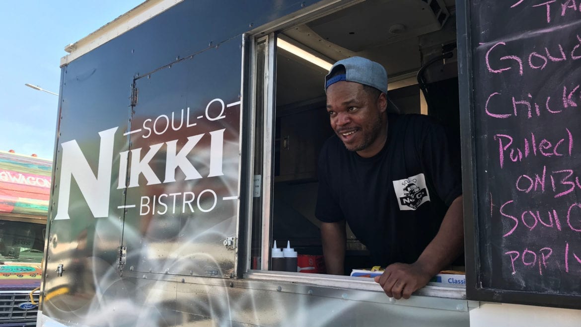 Nate Prim takes an order at Soul-Q Nikki Bistro