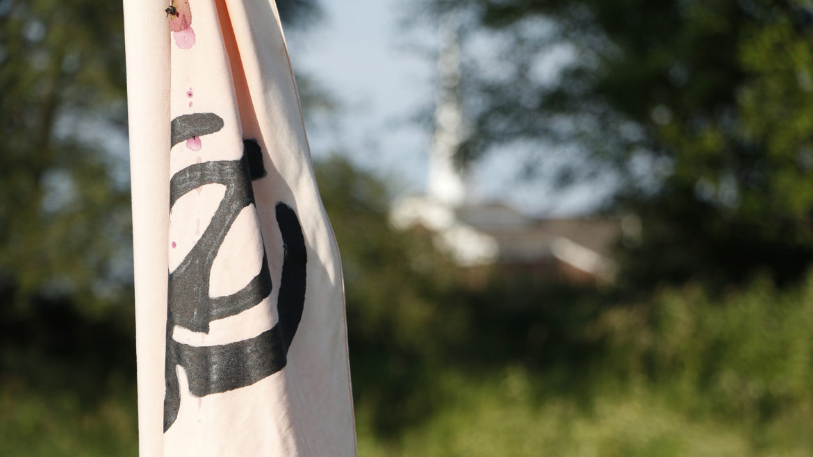 a sikh flag at the new temple site