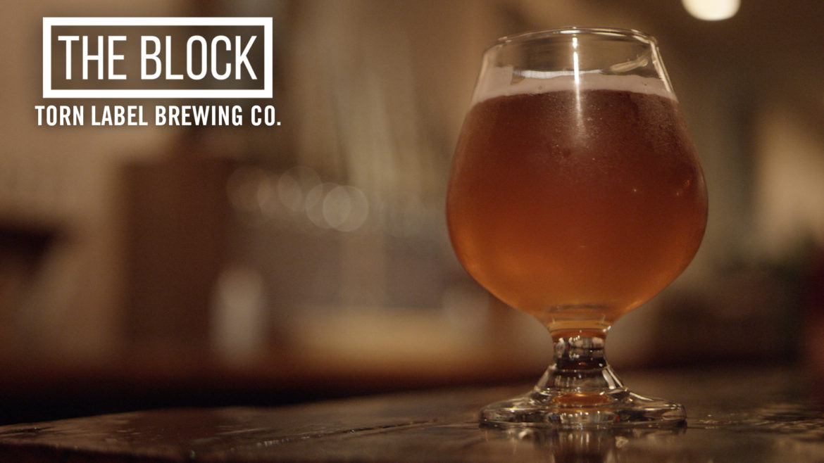 Rafi Chaudry and Travis Moore, co-owners of Torn Label Brewing Co., set aside promising career opportunities in Hollywood and Chicago to brew beer in the Crossroads Arts District.