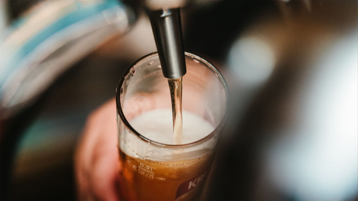 Beer pouring into a glass