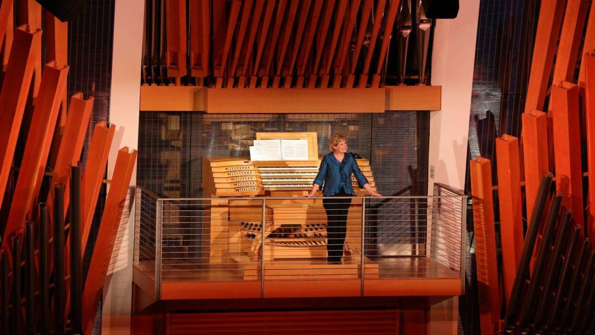 Jan Kraybill with the Julia Irene Kauffman Casavant Organ