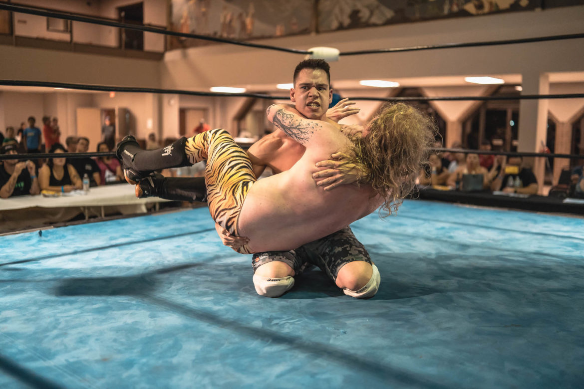 J. Savage cradles Juno Granger on his knees.