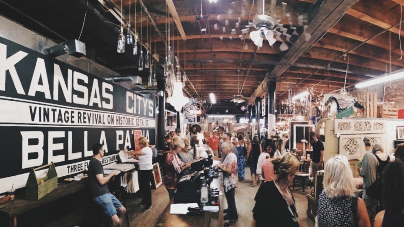 A crowded vintage store counter.