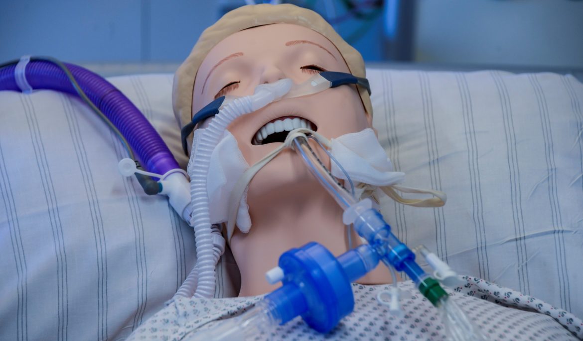 Ventilator attached to training doll.