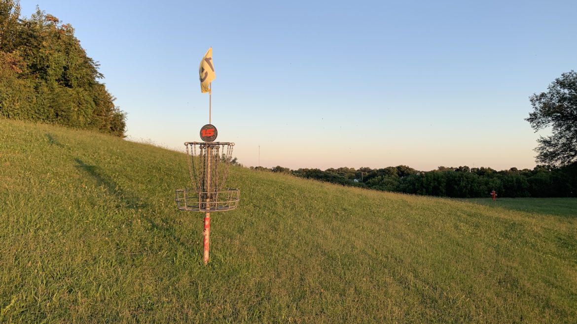 A disc golf basket in Kessler Park on Cliff Drive.