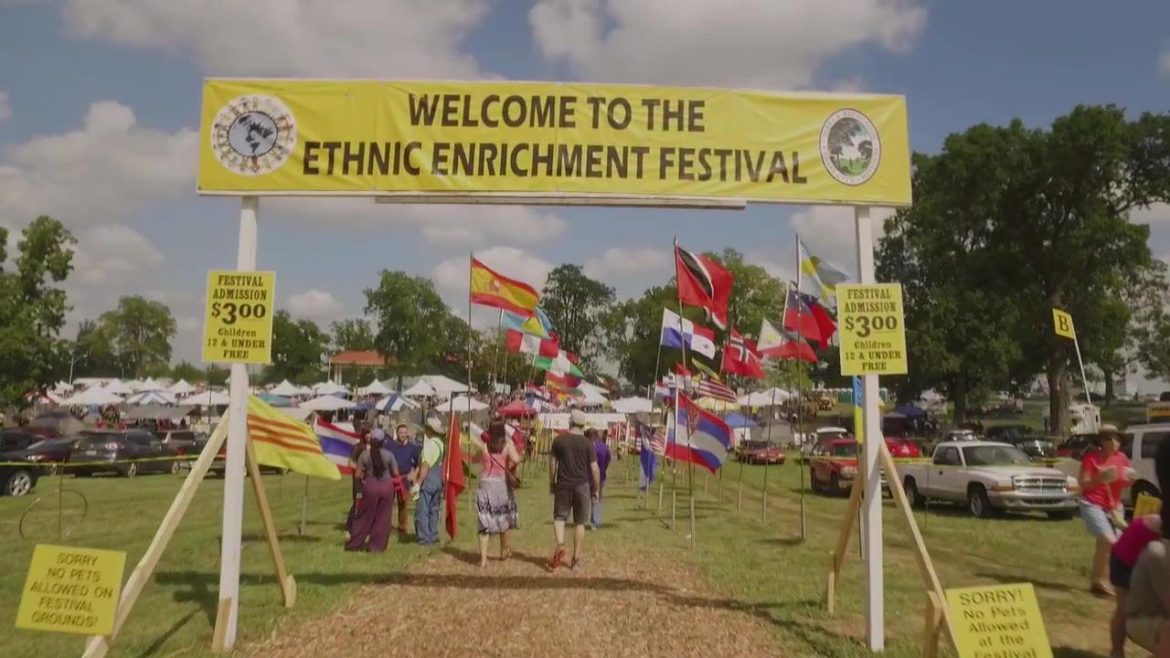A group of people enter the Ethnic Enrichment Festival.