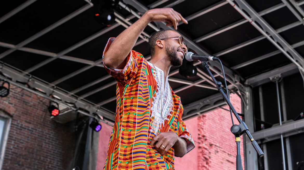Kemet Coleman performs a song.