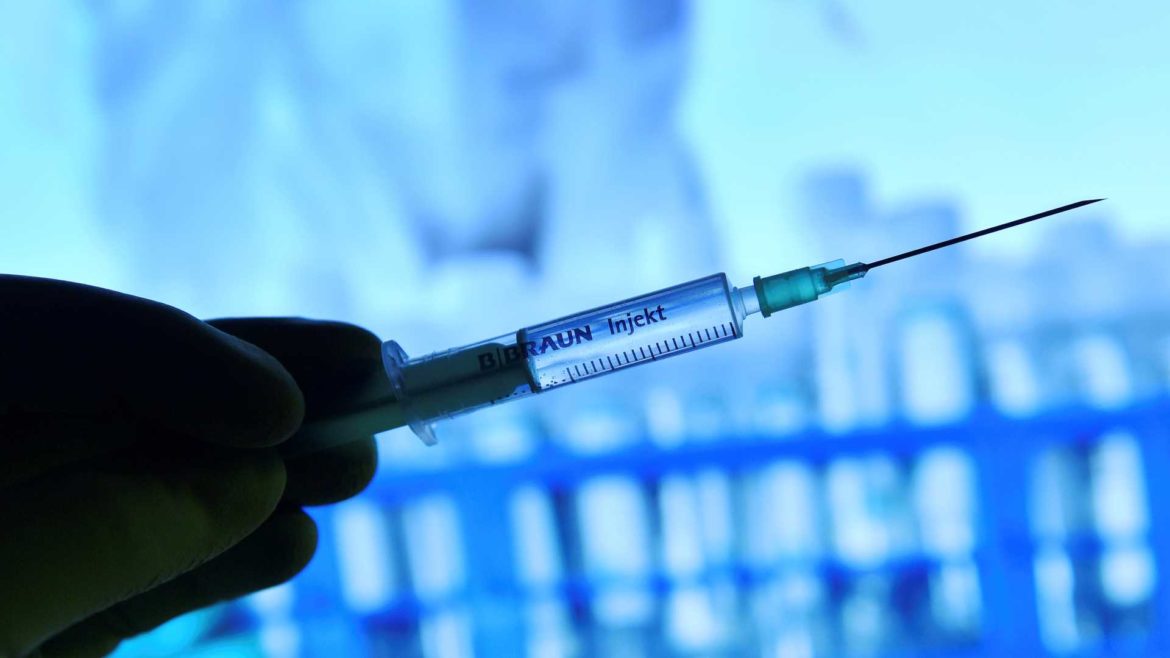 COVID-19 vaccine in a syringe