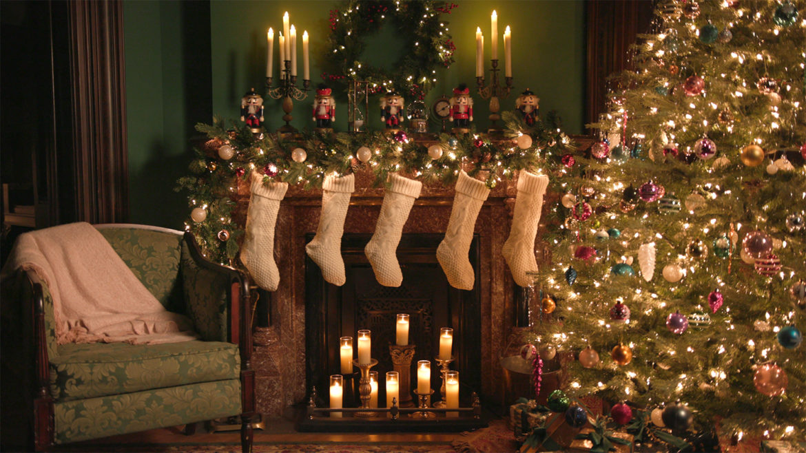 Stockings hang above a fire place.