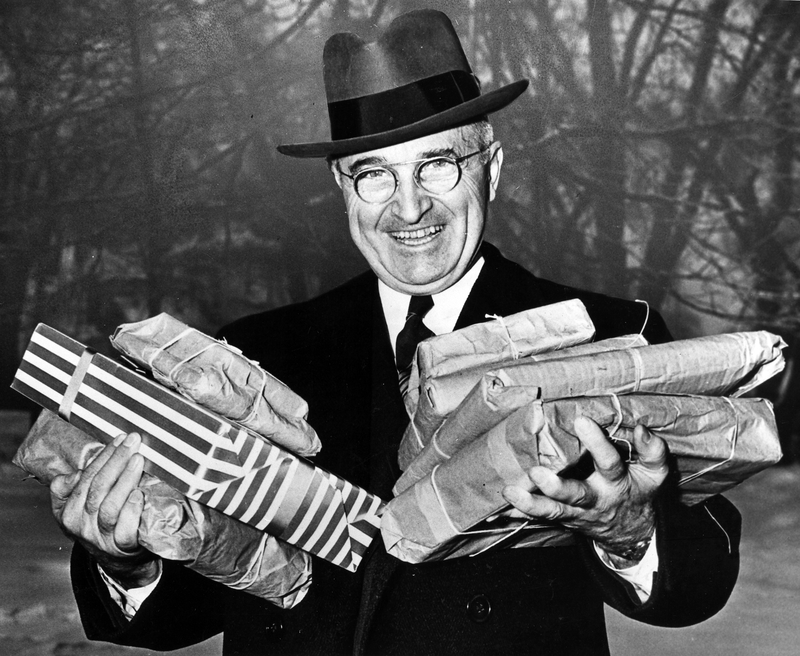 President Harry Truman bearing Christmas gifts