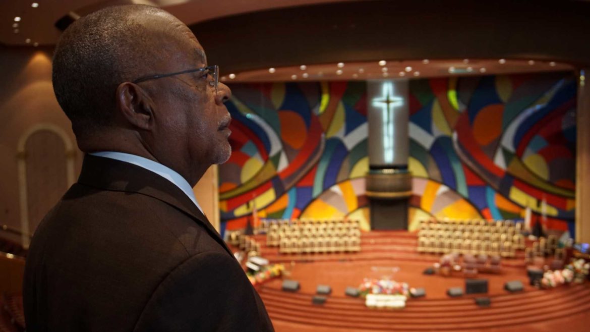 Henry Louis Gates Jr., admires the mural at Church of God In Christ West Angeles.
