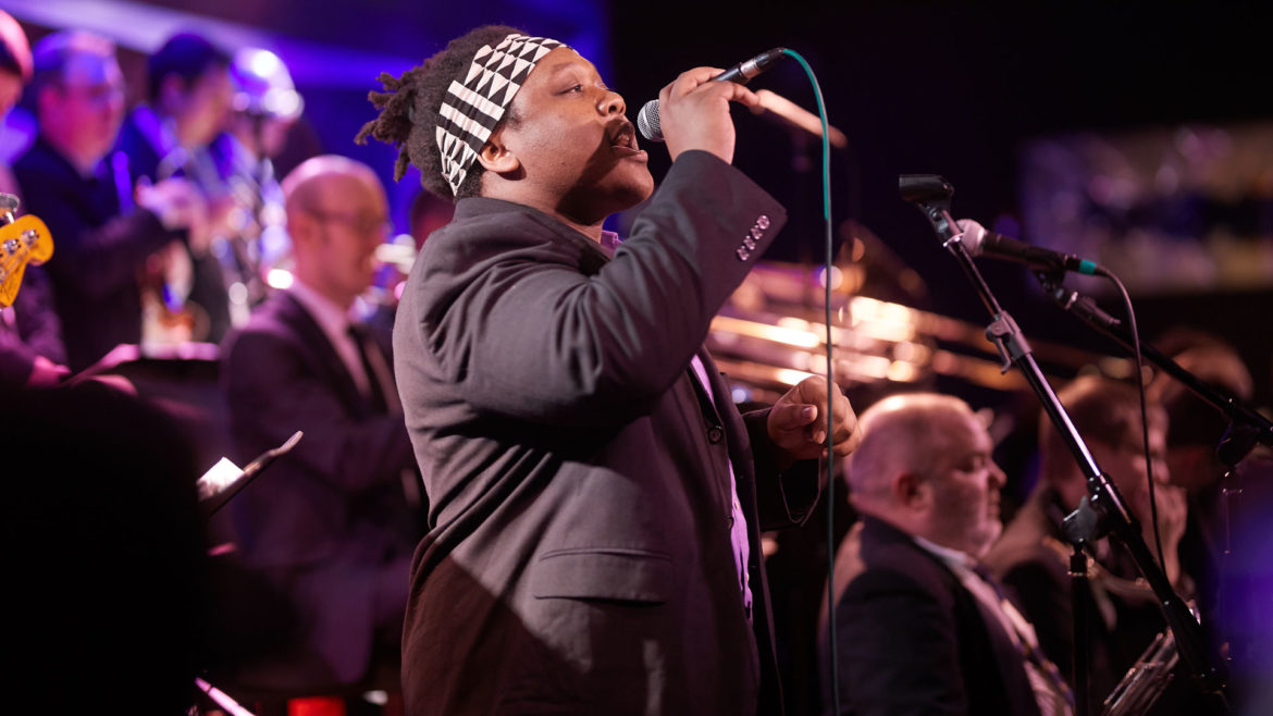 Kadesh Flow performs on stage.