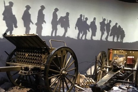 A small theater showcasing Harry Truman's experience as a World War I artillery battery captain displays a field gun used by American troops.
