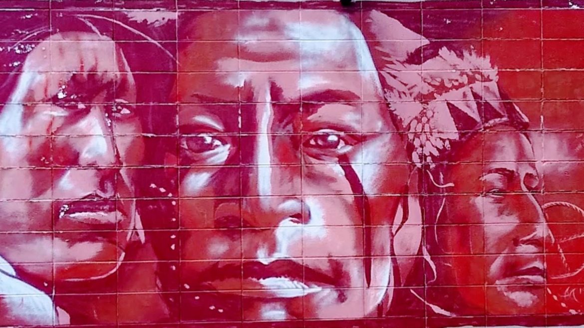 This artwork showing faces of Native Americans is displayed on the east side of the building that houses the Kansas City Indian Center at 600 W. 39th St. in Kansas City.